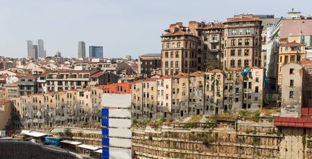 Istanbul, Turkey - a city in constant development, Istanbul needs to build new houses for workers and families coming from all around Turkey. Here in particular a building siteの写真素材
