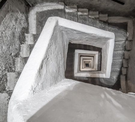 Naples, Italy - built more than 2500 years ago, and widely used during World War II, the Naples subterranean system is a main turist attraction today. Here in particular the staircaseのeditorial素材