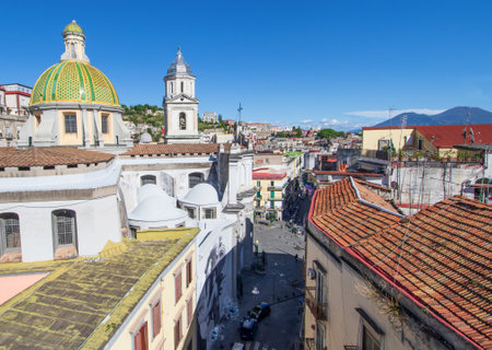 Naples, Italy - located over the Catacombs of San Gaudioso, the Church of Santa Maria della SanitÃ  is very recognizable for its green dome and Mount Vesuvius on the backgroundのeditorial素材