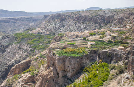 Jebel Akhdar, Oman - located 2000m above the sea level and surrounded by wonderful terraced orchards, the twin villages of As Shuraija and Al Ain are one of the most famous attractions in Omanの写真素材