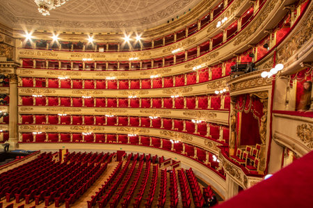 Milan, Italy - one of the leading opera and ballet theaters globally, La Scala is the most famous opera house in Milan. Here in particular its typical red seatsのeditorial素材