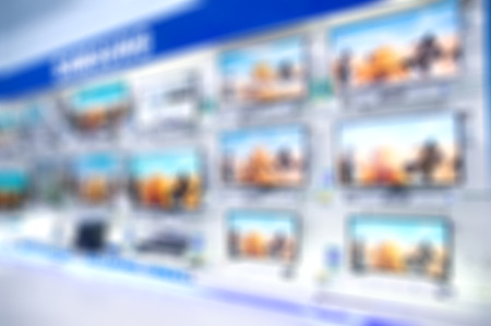 Abstract Blur Background or Defocus of LED  or LCD Flat Television Demo Display in Home Appliance or AV Product Department in Hypermarket or Shopping Mall Retail Outletの写真素材