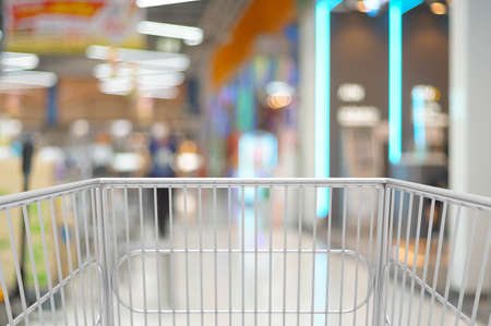 Shopping Kart with Blur Background and bokeh of Shopping Arcade Mall or Department store as Modern Lifestyle Concept.の写真素材