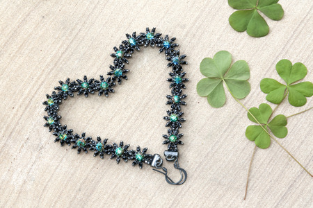 Beautiful flowers earring heart shapeの写真素材
