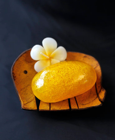 Yellow Herbal soap on elephant soap dishの写真素材