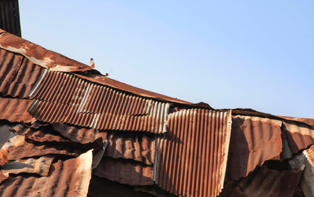 Damage rusty roof of the factory in Thailandの写真素材