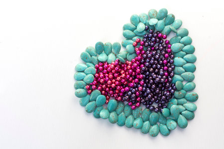 Stone and colourful heartの写真素材