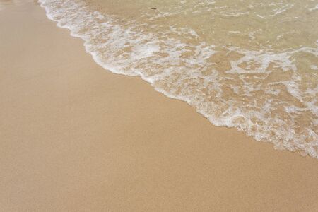 Beach sand and wave の写真素材