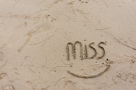 Miss you word with space on the sandの写真素材