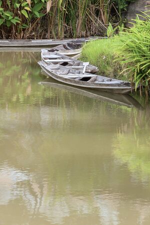 Wooden boat on the riverの写真素材