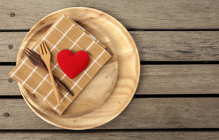 Wooden kitchenware lover concept with space on wood floorの写真素材