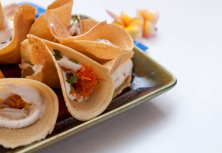 Closeup Thai crispy pancake with space on white の写真素材