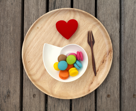 Wooden plate with space on wood floorの写真素材