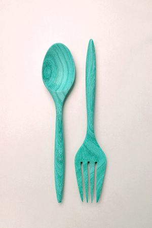 Vintage tone light blue wooden fork and spoonの写真素材