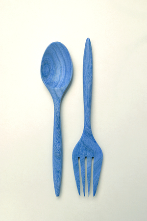 Vintage tone blue wooden fork and spoonの写真素材