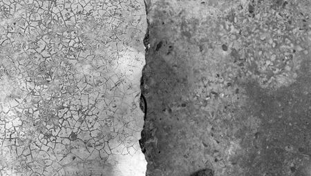 Black and white tone broken cement floor backgroundの写真素材