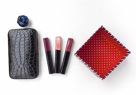Black clutches bag with lips gloss stick and gift boxの写真素材