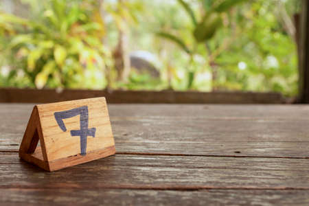 Wooden table sign with space on tableの写真素材