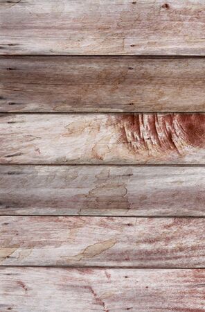 Wooden wall texture with old red paint background vertical styleの写真素材