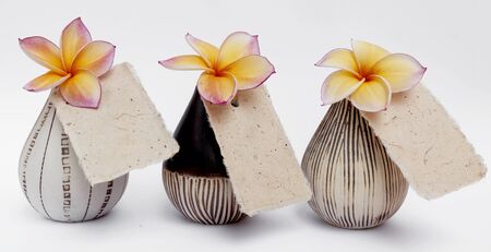 Design ceramic vase collection with flower and price tag on white backgroundの写真素材