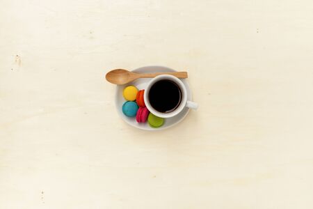 Black coffee with wooden spoon with space on wood backgroundの写真素材