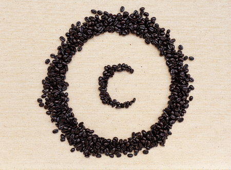 Coffee beans sign on canvas backgroundの写真素材