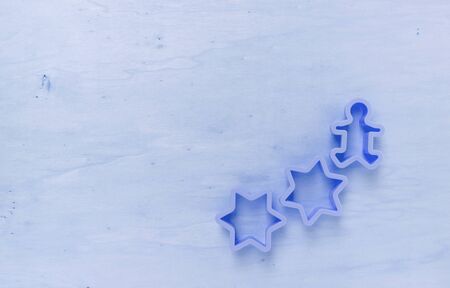 Blue tone wood background with star cookie cutterの写真素材