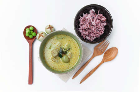 Thai green curry with fish ball and rice on white backgroundの写真素材