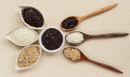 Rice and wooden spoon setの写真素材