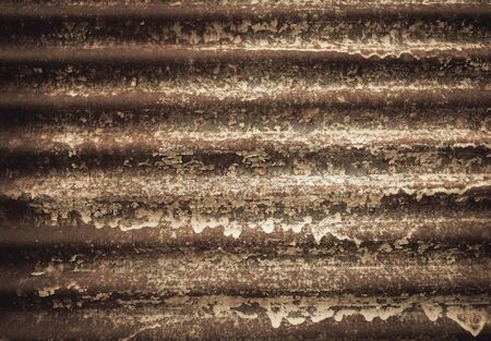 Vintage tone closeup rusty wall backgroundの写真素材