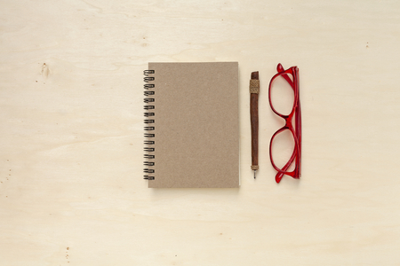 Blank brown notebook and cinnamon penの写真素材