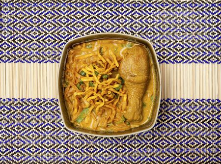 Thai style egg noodle with chicken curryの写真素材