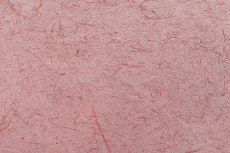 Natural texture of red paper backgroundの写真素材