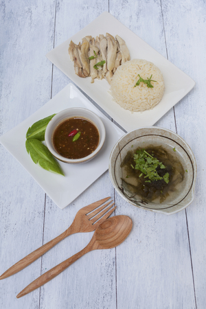 Chicken rice with spicy Thai style sauce and clear soupの写真素材