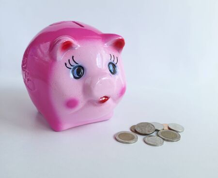 Pink saving pig on white background