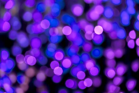 Abstract background of purple light bokehの写真素材