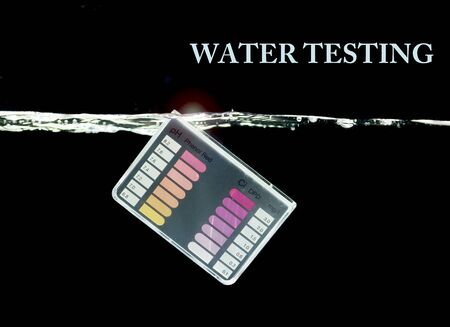 Water testing kit on black backgroundの写真素材