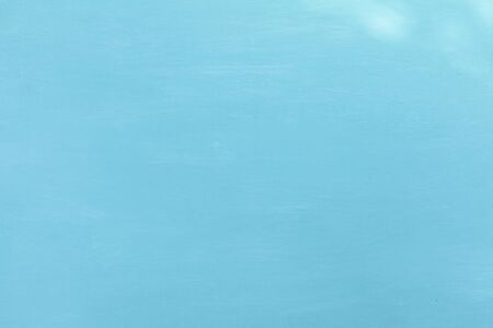 Blue paint on wooden table backgroundの写真素材