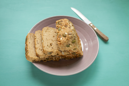 Healthy bread on blue tableの写真素材