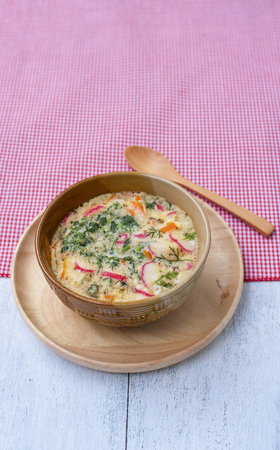 Steamed egg with vegetables and crab stickの写真素材