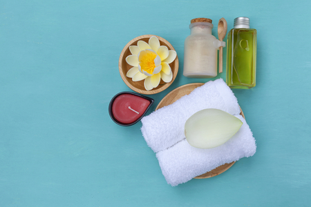 Mini Home spa set on blue table backgroundの写真素材