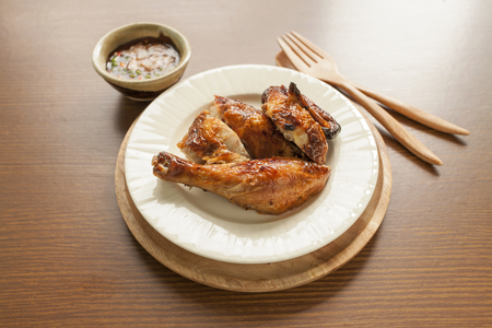 Rosted chicken with thai style spicy sauce thaiの写真素材