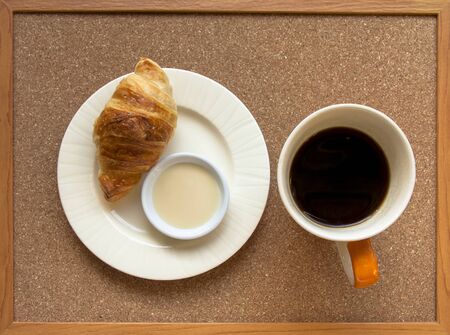 Breakfast set on corckboard trayの写真素材