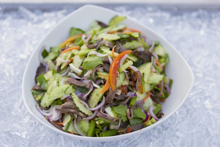 Thai style Spicy beef salad with cucumberの写真素材