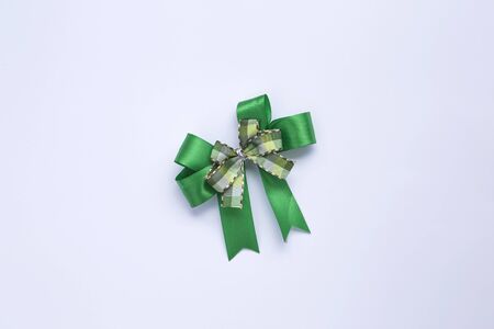 Green ribbon design on white backgroundの写真素材