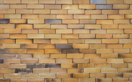 Old red brick wall pattern background, outdoor day lightの写真素材