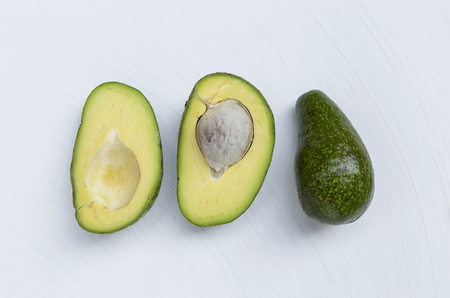 Avocado on white texture background