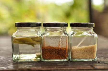 Chili in vinega, sugar and chili powder in glass bowlの写真素材