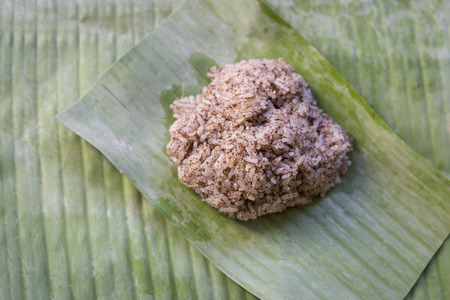 Thai style Sticky rice on banana leafの写真素材