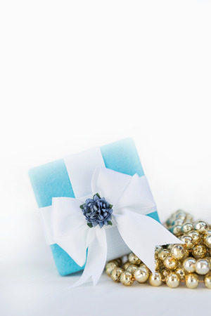 Blue gift box on white backgroundの写真素材